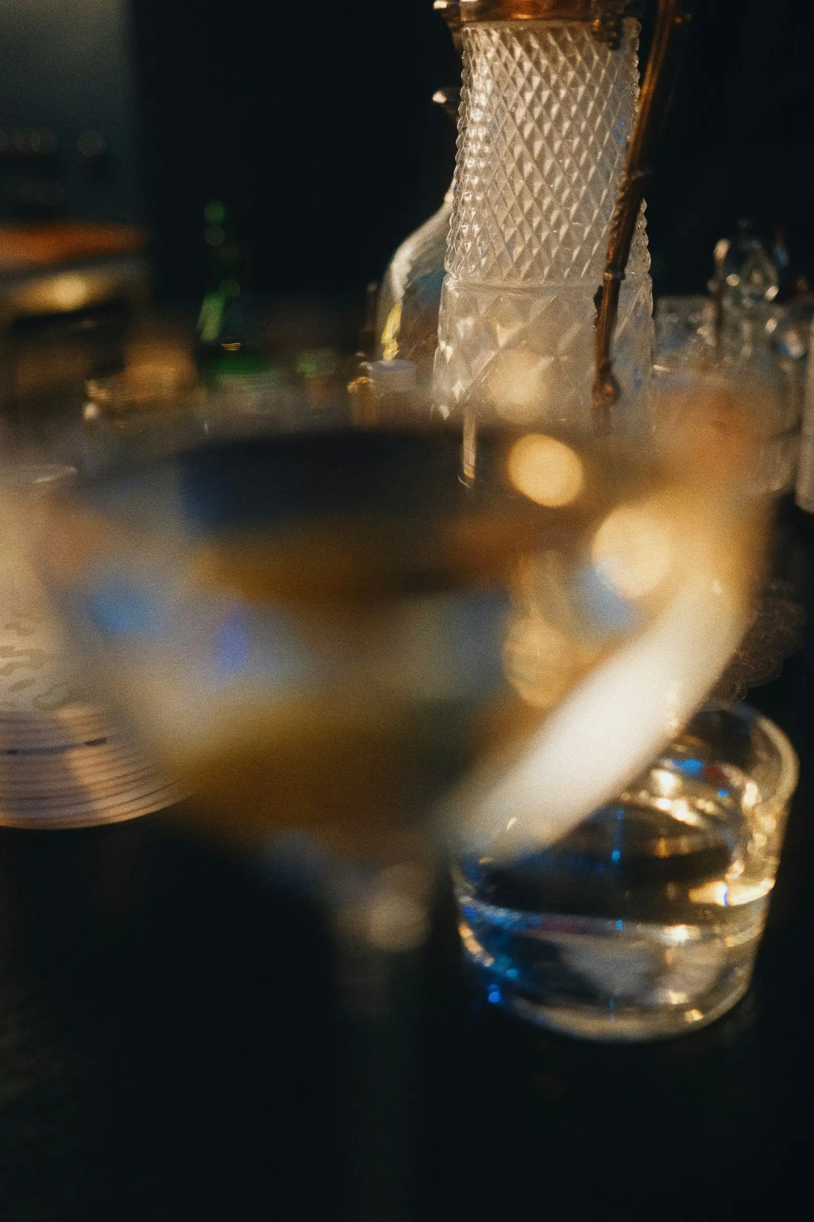 Cocktails on a low-lit lounge table